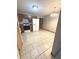 Eat-in kitchen featuring tile flooring, and dining area with hanging light fixture at 2629 Calabash Dr, Indianapolis, IN 46217