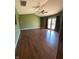 Inviting living room boasts vaulted ceilings, laminate floors, and large windows at 2629 Calabash Dr, Indianapolis, IN 46217