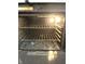 Image shows oven interior with two racks and broiler on the bottom at 2629 Calabash Dr, Indianapolis, IN 46217