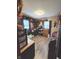 Bedroom featuring hardwood floors, clothing racks, storage cubbies along the walls, and lots of character at 2650 Woodrow Ave, Indianapolis, IN 46241