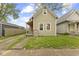 Charming home featuring a well-maintained lawn and quaint architectural details at 314 N Reisner St, Indianapolis, IN 46222