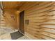 A wood porch entry features a front door at 314 N Reisner St, Indianapolis, IN 46222