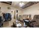 A living room features several chairs and an doorway at 314 N Reisner St, Indianapolis, IN 46222