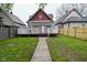 Charming home with a cozy back deck and a well-manicured lawn at 344 N Addison St, Indianapolis, IN 46222