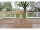 Well maintained backyard features a lawn, wood fence, and mature tree at 344 N Addison St, Indianapolis, IN 46222