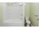 Bright bathroom features a bathtub and shower with a sleek toilet at 344 N Addison St, Indianapolis, IN 46222