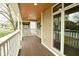 Spacious front porch featuring recessed lighting and white railings at 344 N Addison St, Indianapolis, IN 46222