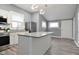 Well-appointed kitchen featuring an island, granite countertops, and stainless steel appliances at 344 N Addison St, Indianapolis, IN 46222