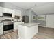 Modern kitchen featuring white cabinets, granite countertops, and stainless steel appliances at 344 N Addison St, Indianapolis, IN 46222