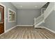 Cozy living room with wood-look floors, neutral walls, and natural light at 344 N Addison St, Indianapolis, IN 46222
