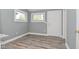 Bright living room with wood plank flooring and plenty of natural light at 344 N Addison St, Indianapolis, IN 46222