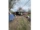 Backyard with debris. The area needs significant decluttering and cleaning at 3742 S Walcott St, Indianapolis, IN 46227