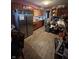 Displays wooden cabinetry, stainless steel refrigerator, and laminated floors, but it is extremely cluttered at 3742 S Walcott St, Indianapolis, IN 46227