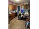 Features a sink, oven, wooden cabinetry, and laminated floors, but is cluttered and in need of decluttering at 3742 S Walcott St, Indianapolis, IN 46227