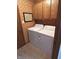 A functional laundry room featuring side-by-side washer and dryer units at 379 Vinewood N Dr, Brownsburg, IN 46112