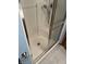 Bathroom stall shower features tiled flooring, hand shower and grab bar at 379 Vinewood N Dr, Brownsburg, IN 46112