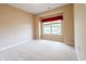 Bedroom with neutral carpet and window at 4061 Melbourne Dr, Columbus, IN 47203