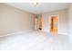 Neutral bedroom with clean white carpet, two closets, and light-colored walls at 4061 Melbourne Dr, Columbus, IN 47203
