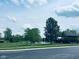 Beautiful community space features a pond, gazebo, and lush green lawns for recreation and relaxation at 4061 Melbourne Dr, Columbus, IN 47203