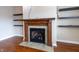 Close-up of the living room fireplace with mantel and built in shelving at 4061 Melbourne Dr, Columbus, IN 47203