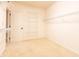 Spacious walk-in closet with wire shelving for ample storage space at 4061 Melbourne Dr, Columbus, IN 47203