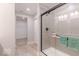 Bathroom offers glass enclosed shower with subway tile and matte black hardware at 4722 E Shadowbrook Dr, Camby, IN 46113