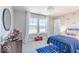Bedroom with fire truck decor and large window at 4722 E Shadowbrook Dr, Camby, IN 46113