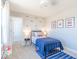 Bedroom with natural light, fire truck decor, and closet access at 4722 E Shadowbrook Dr, Camby, IN 46113