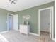 Well-lit Bedroom features a dresser and ample closet space for storage and organization at 4722 E Shadowbrook Dr, Camby, IN 46113