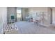 Spacious bedroom with desk, bookshelves, and an easel for a creative space at 4722 E Shadowbrook Dr, Camby, IN 46113