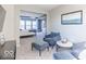 Bedroom with sitting area, decorated with artwork and natural light at 4722 E Shadowbrook Dr, Camby, IN 46113