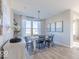 Elegant dining room featuring stylish decor and comfortable seating around a large dining table at 4722 E Shadowbrook Dr, Camby, IN 46113