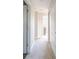 Hallway featuring neutral colors and carpet flooring at 4722 E Shadowbrook Dr, Camby, IN 46113