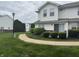 Well-maintained condo with manicured landscaping and a sidewalk leading to the entrance at 4948 Potomac Square Pl, Indianapolis, IN 46268