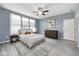 Serene bedroom with soft lighting, a comfortable bed, and modern furnishings for a relaxing retreat at 5110 Lilium Dr, Plainfield, IN 46168