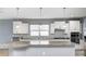 Bright kitchen featuring a large island with pendant lighting and modern appliances at 5110 Lilium Dr, Plainfield, IN 46168