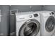 Convenient laundry area with front-loading Samsung washer and dryer at 5110 Lilium Dr, Plainfield, IN 46168