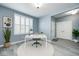 Bright office space with a white desk, comfortable seating, and natural light, perfect for working from home at 5110 Lilium Dr, Plainfield, IN 46168