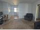 Inviting living room with carpet and view of the entry at 5703 Wood Hollow Dr, Indianapolis, IN 46239