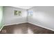 A bright bedroom features hardwood floors and natural light at 5719 Laurel Hall Dr, Indianapolis, IN 46226