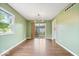 Dining room featuring hardwood floors, natural light, and sliding glass doors to the backyard at 5719 Laurel Hall Dr, Indianapolis, IN 46226