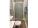 Compact bathroom showcasing a standing shower, toilet, and sink, designed for practicality at 598 Young St, Franklin, IN 46131