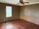 Sizeable bedroom with a ceiling fan offering natural light and space for creating a comfortable retreat at 598 Young St, Franklin, IN 46131