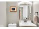 Well-lit bathroom features a modern mirror and sleek fixtures at 6340 Monitor Ln, Indianapolis, IN 46220