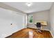 Bedroom with wood floors, closet, and natural light, offers a simple and functional space at 6340 Monitor Ln, Indianapolis, IN 46220