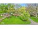 Charming home with a well-manicured front yard, mature trees, and a private driveway at 6340 Monitor Ln, Indianapolis, IN 46220