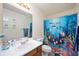 This bathroom has under-the-sea decor, with fish and sea creature accents at 6373 Thornridge Dr, Avon, IN 46123
