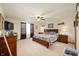 This main bedroom is light and airy, with a ceiling fan and lots of space at 6373 Thornridge Dr, Avon, IN 46123