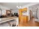 Open-concept kitchen seamlessly flows into a cozy living area with a fireplace and comfortable seating at 6373 Thornridge Dr, Avon, IN 46123