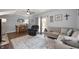 Bright and airy living room with neutral tones, stylish decor, and ample seating at 6373 Thornridge Dr, Avon, IN 46123